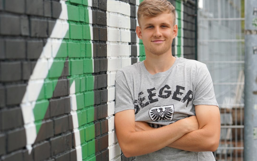 Gebürtiger Münsteraner Gianluca Przondziono wird ein Adlerträger